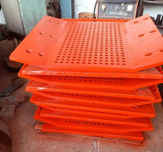 Stack of machined screen plates ready for despatch